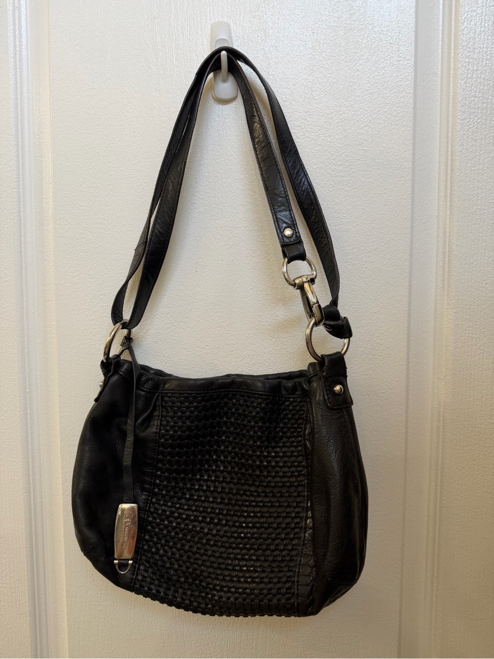 B. Makowsky black leather bag